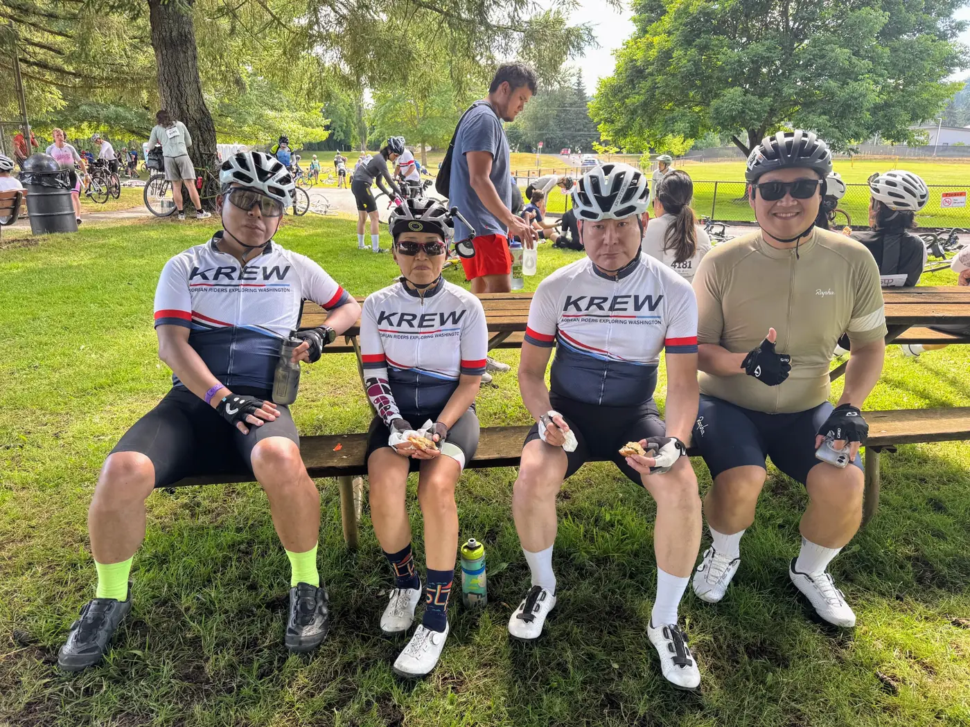 KREW riders taking a break together during a cycling event