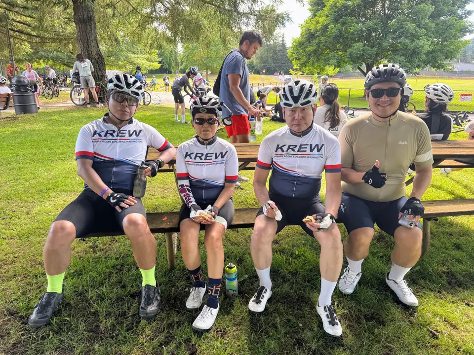 KREW riders taking a break during a group ride