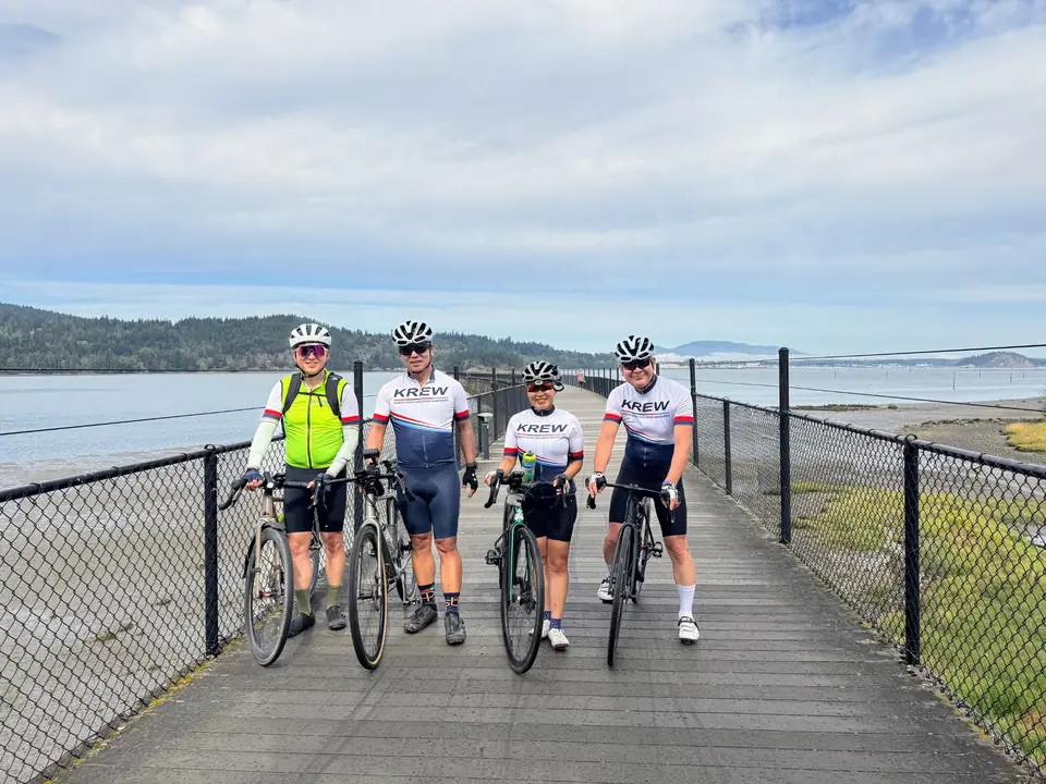 KREW riders on a waterfront trail