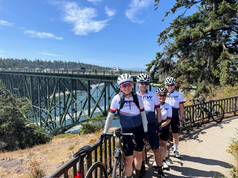 KREW riders at a scenic bridge overlook